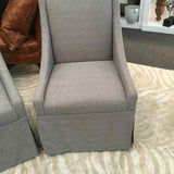 Universal Gray Skirted Fabric Dining Side Chair On Wheels